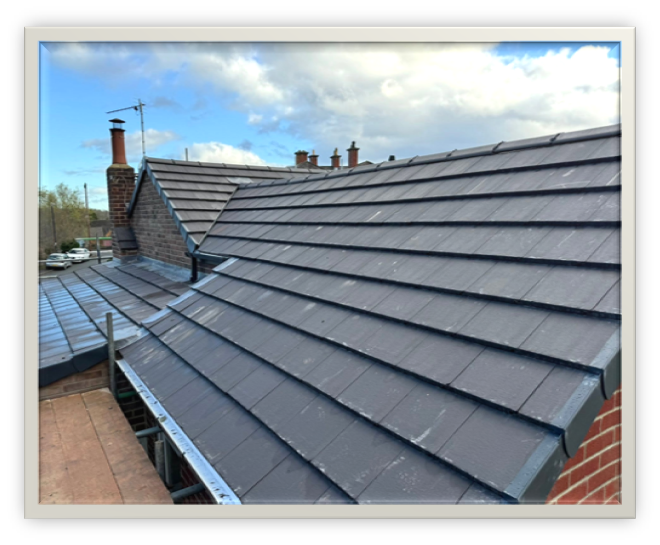 Completed slate tiled roof by BH Roofing